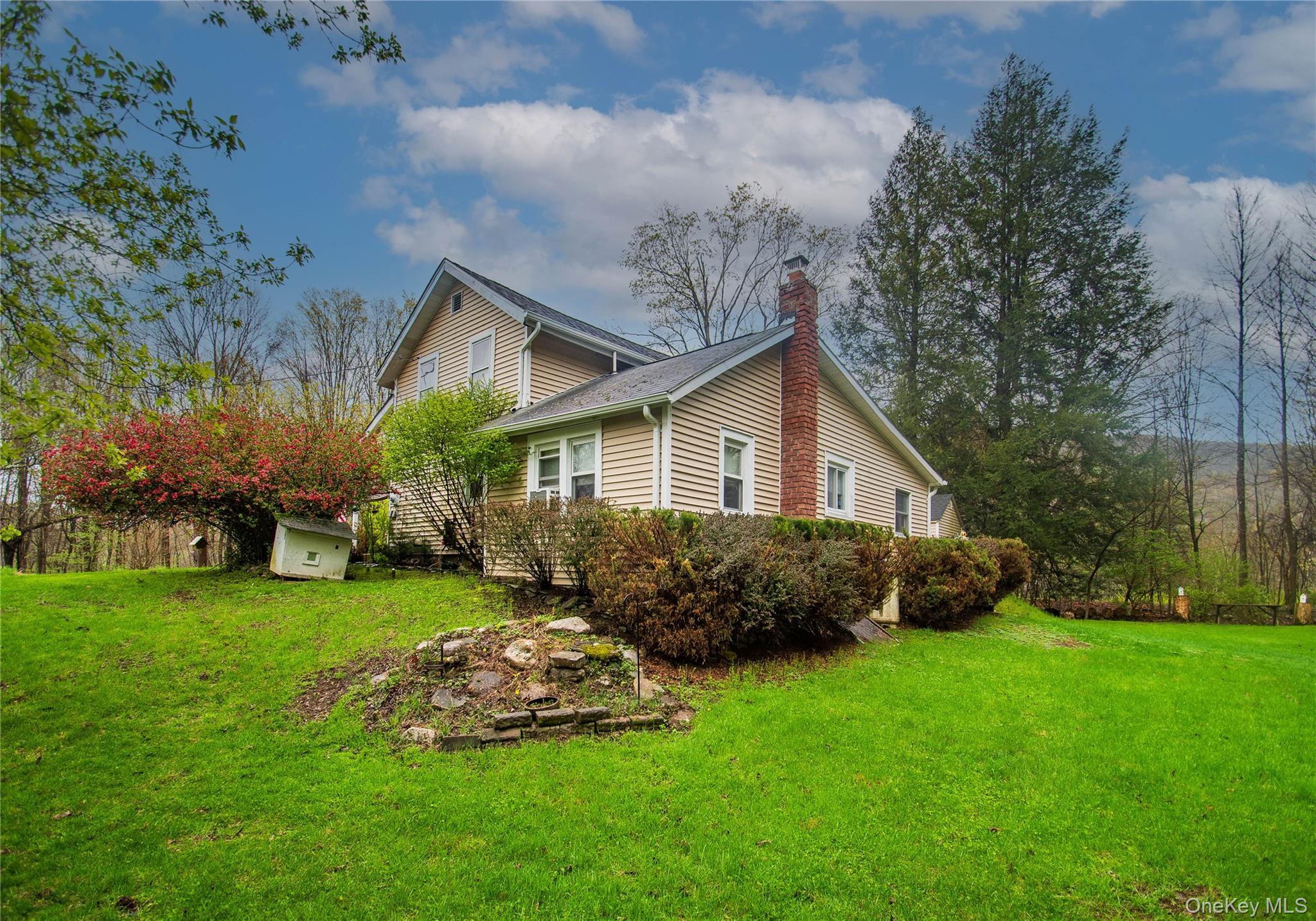 62 Thornton Road Wurtsboro, NY 12790 - Photo 3 of 30 a front view of house with garden