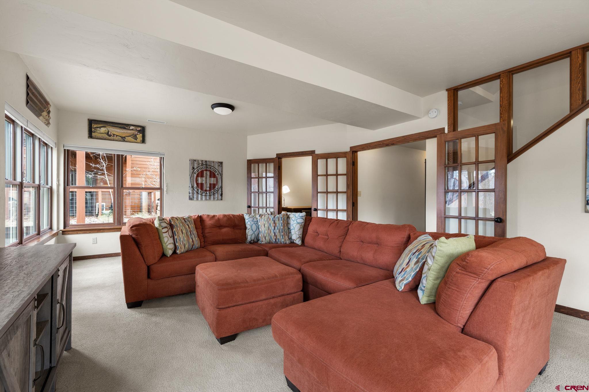 212 Copper Rim Trail, Unit B Durango, CO 81301 - Photo 25 of 44 Large downstairs family room with walkout.