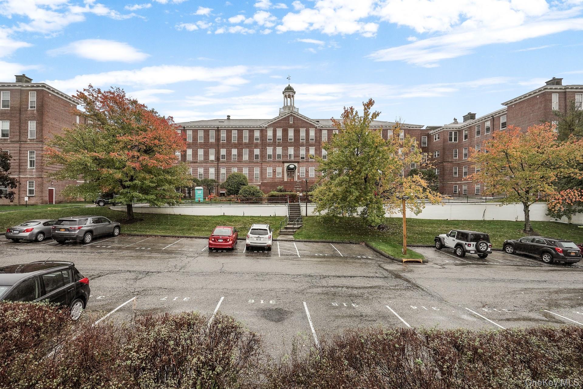1701 Crompond Road, Unit 6313 Peekskill, NY 10566 - Photo 12 of 13 a view of a street with a cars parked in front of it