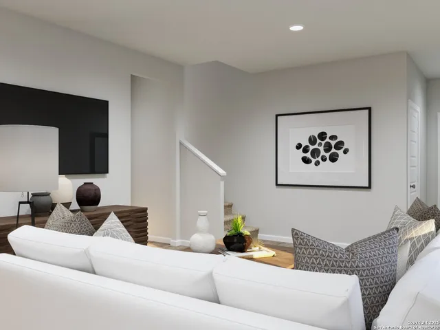 a living room with furniture and a couch