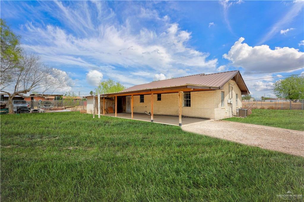 3101 Tom Gill Road Penitas, TX 78576 - Photo 15 of 16 a view of a backyard of the house