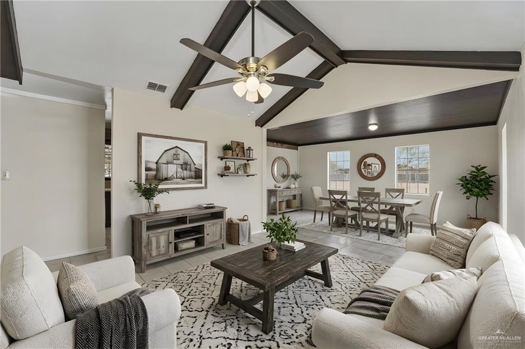 3101 Tom Gill Road Penitas, TX 78576 - Photo 5 of 16 a living room with furniture and a clock