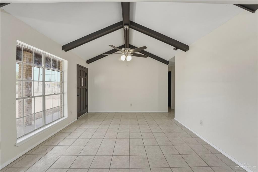 3101 Tom Gill Road Penitas, TX 78576 - Photo 6 of 16 a view of an empty room with a window