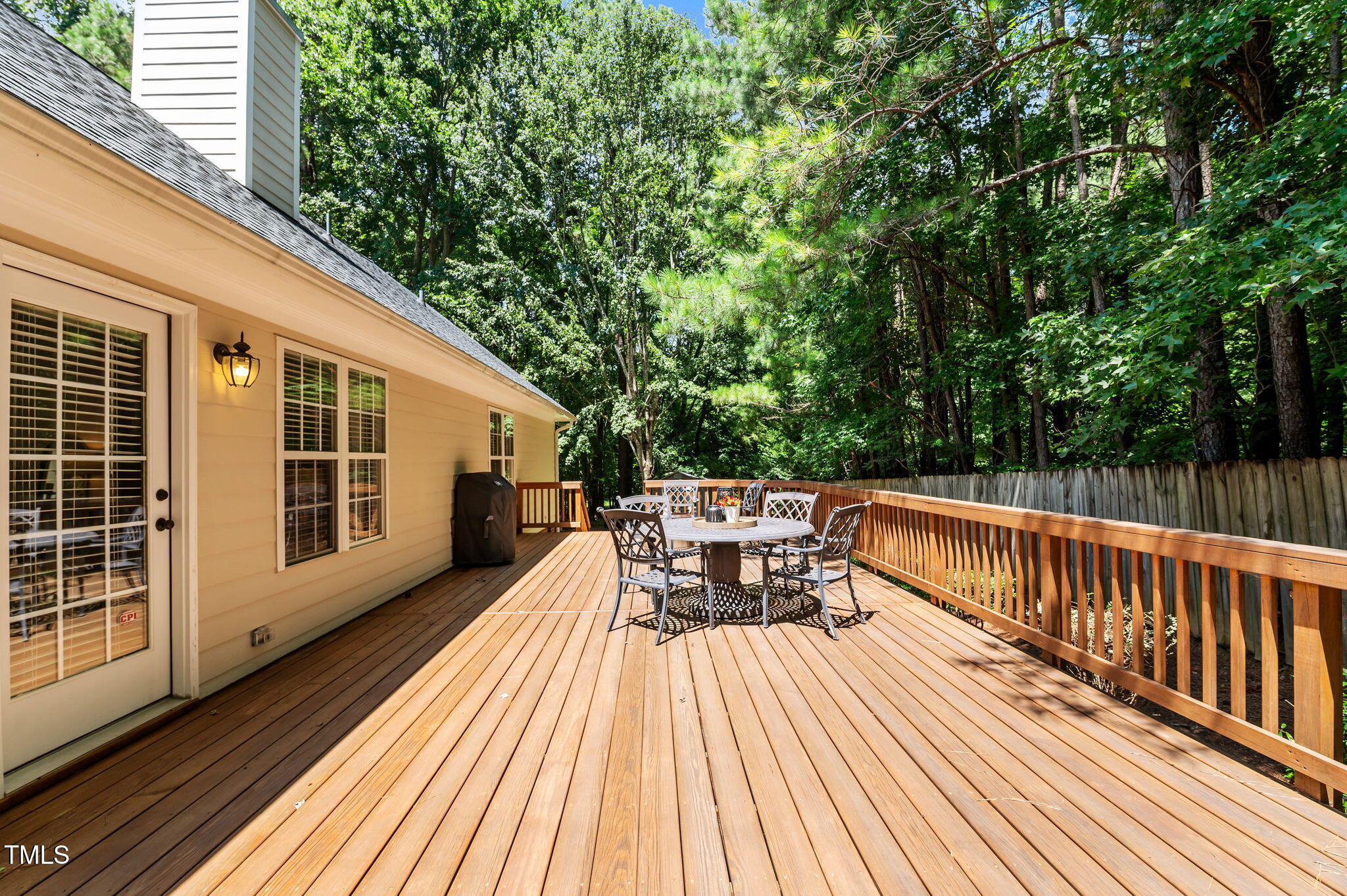 11924 Larka Court Raleigh, NC 27613 - Photo 33 of 44 a view of balcony with deck and wooden floor