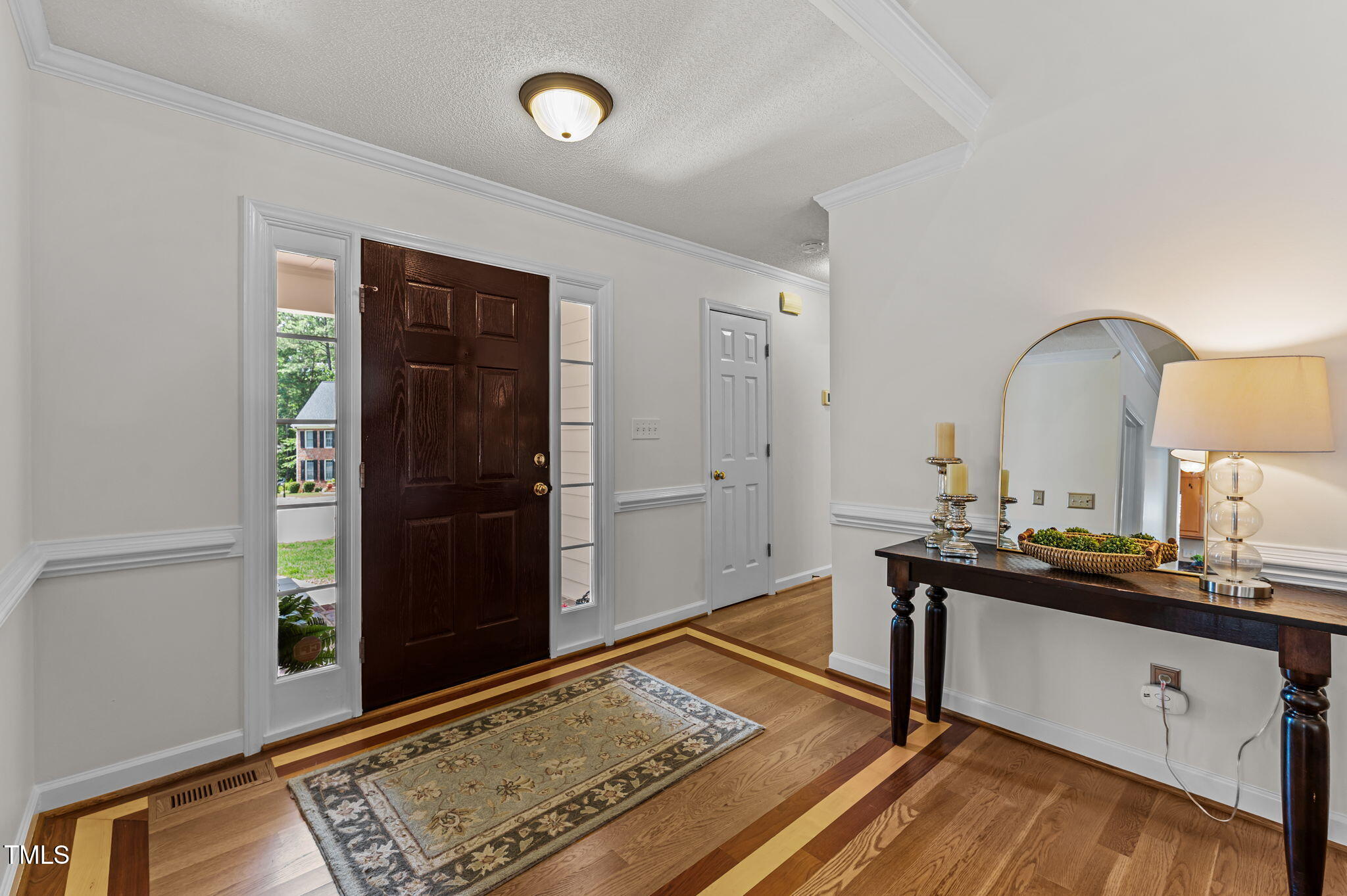 11924 Larka Court Raleigh, NC 27613 - Photo 5 of 44 a view of a double sink and a mirror
