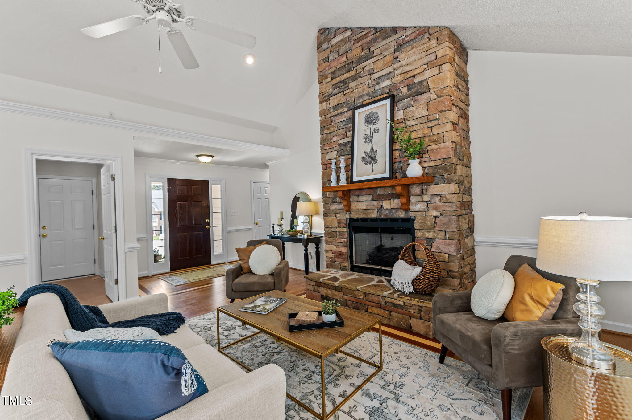 11924 Larka Court Raleigh, NC 27613 - Photo 8 of 44 a living room with furniture and a fireplace