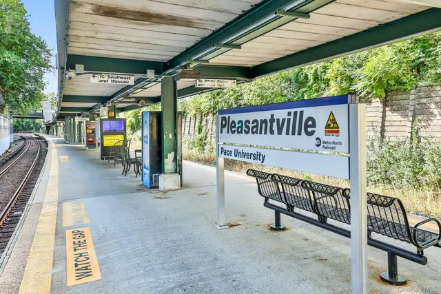 a view of a chairs and table in the patio