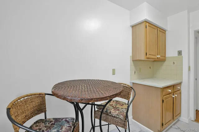 a view of hallway with dining area