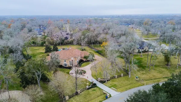 an aerial view of lake residential house with outdoor space