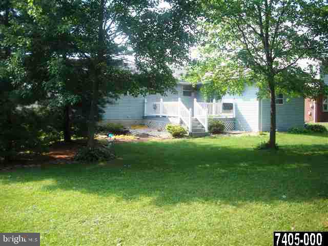 1780 Lilac Road York, PA 17408 - Photo 2 of 21 a front view of a house with garden