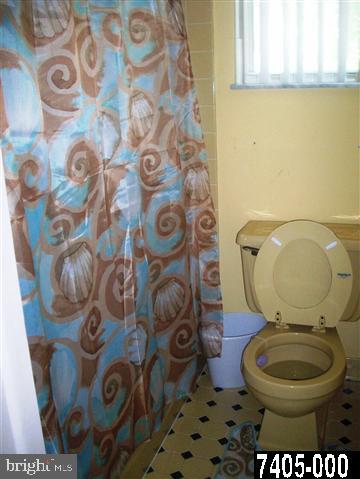 1780 Lilac Road York, PA 17408 - Photo 13 of 21 a bathroom with a toilet and a sink