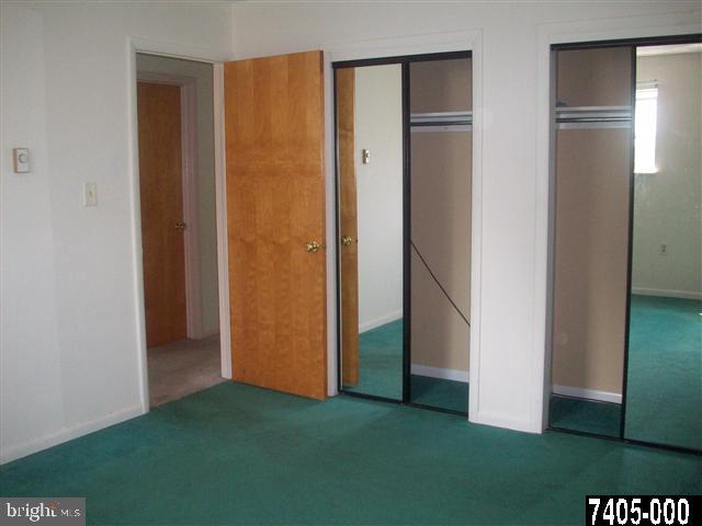 1780 Lilac Road York, PA 17408 - Photo 18 of 21 a view of an empty room with closet and a window