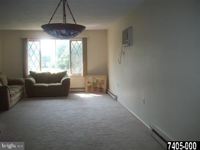 1780 Lilac Road York, PA 17408 - Photo 7 of 21 a view of livingroom with furniture and windows