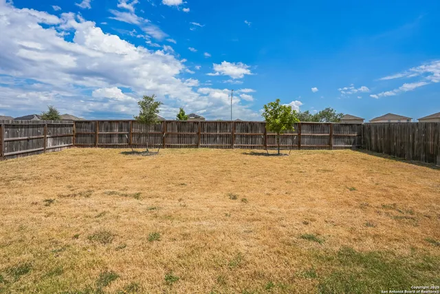 a house view with a outdoor space