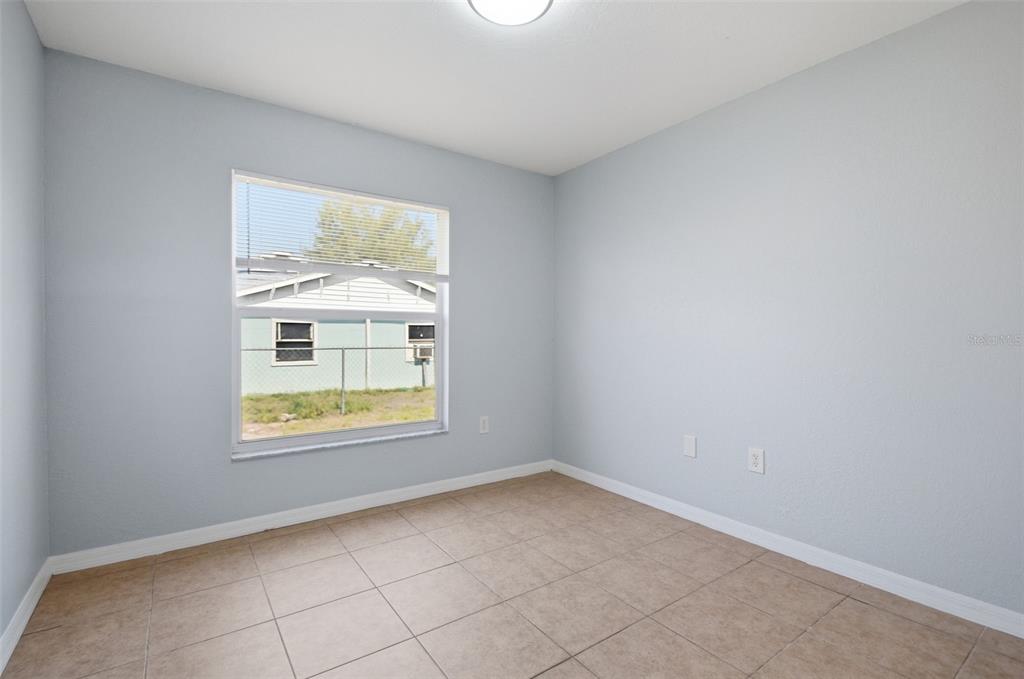 6018 Flora Terrace Apollo Beach, FL 33572 - Photo 16 of 33 an empty room with a window
