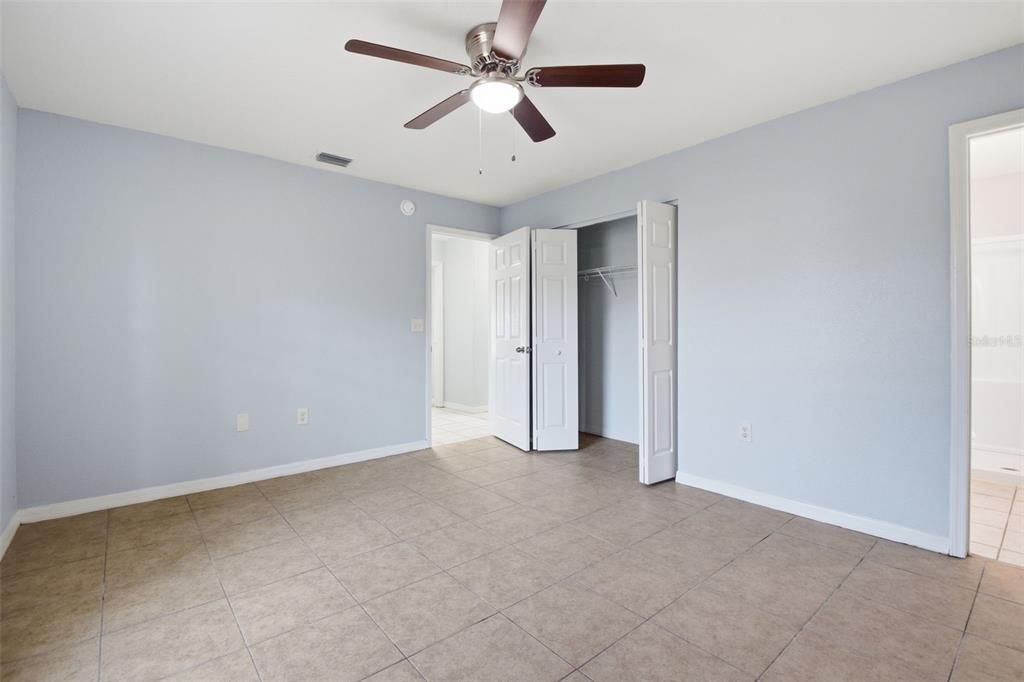 6018 Flora Terrace Apollo Beach, FL 33572 - Photo 23 of 33 wooden floor in an empty room