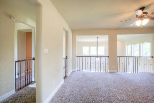 a view of a room with windows