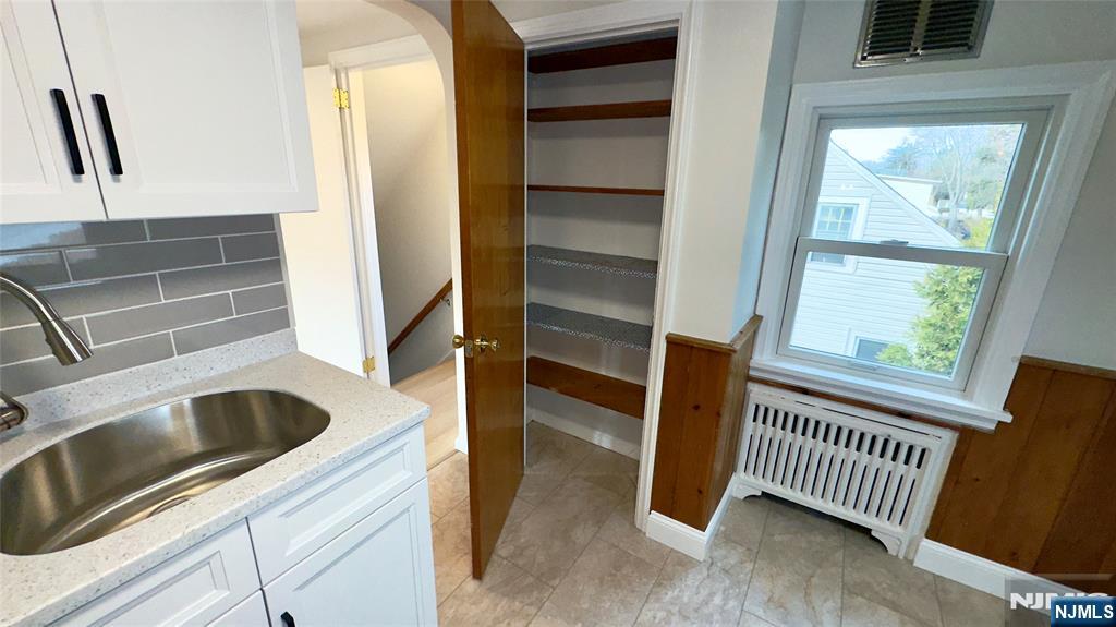163 Center Street, Unit 2 New Milford, NJ 07646 - Photo 19 of 25 a view of a kitchen from a windows