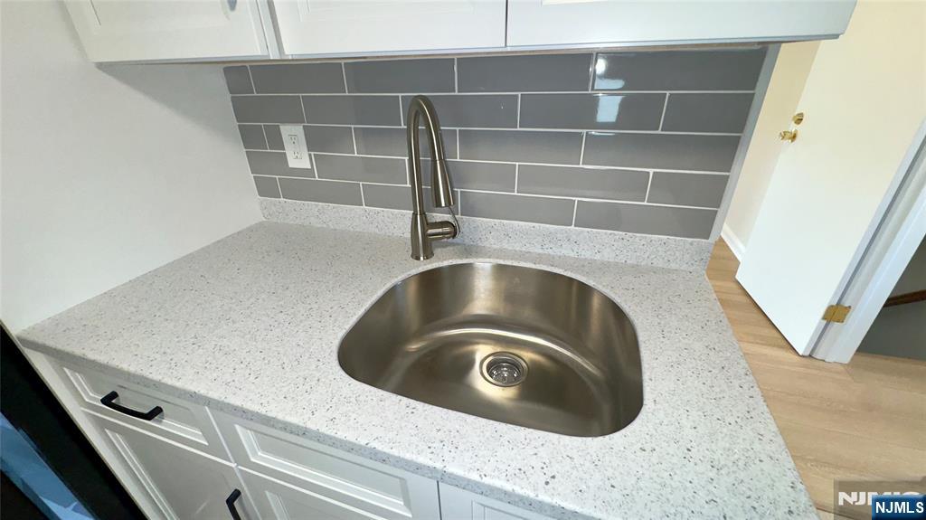 163 Center Street, Unit 2 New Milford, NJ 07646 - Photo 20 of 25 view of kitchen with a washer and dryer