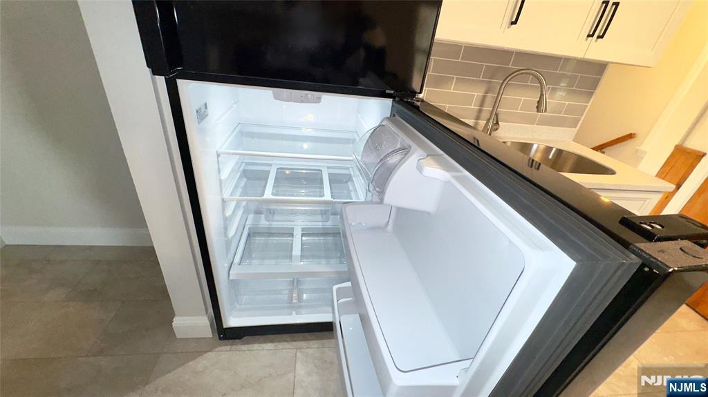 163 Center Street, Unit 2 New Milford, NJ 07646 - Photo 22 of 25 a view of front door