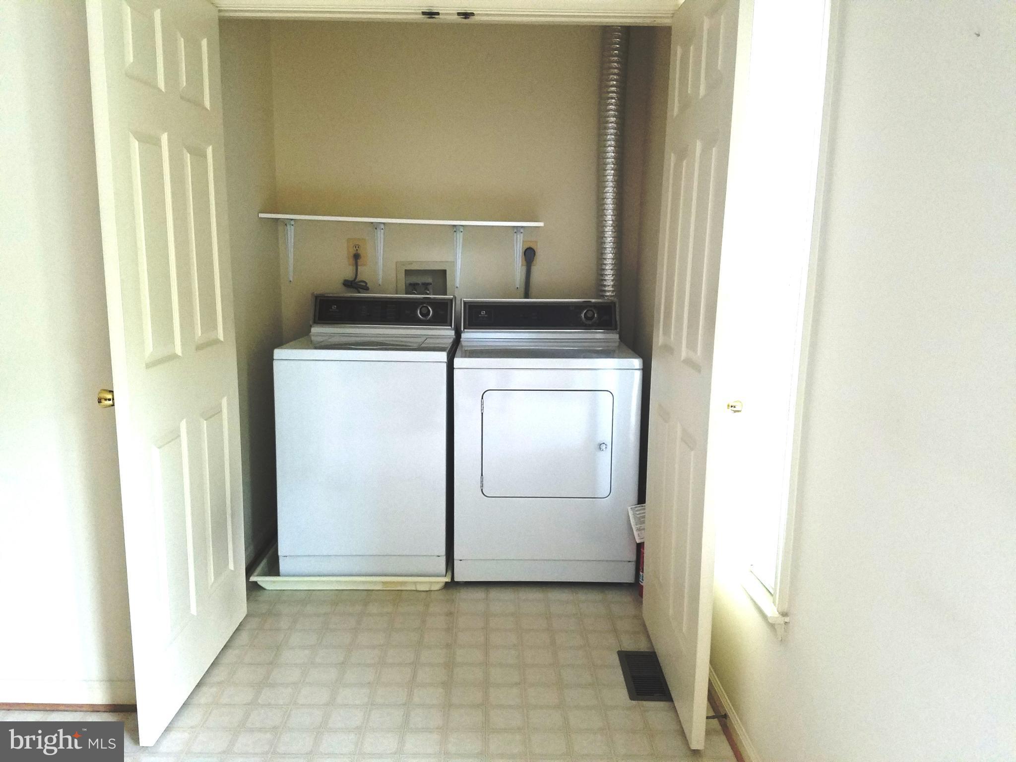 4705 Columbia Road Ellicott City, MD 21042 - Photo 13 of 28 Laundry in Kitchen Area
