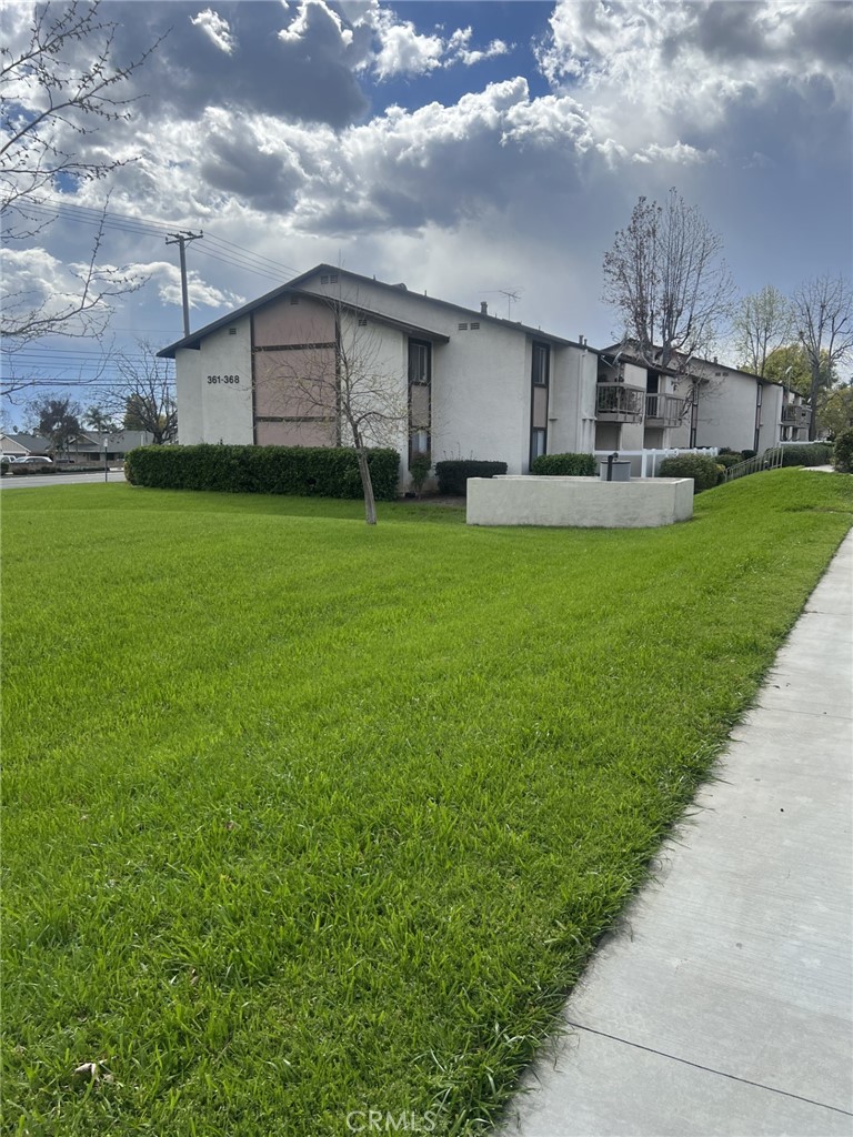 8990 19th Street, Unit 368 Rancho Cucamonga, CA 91701 - Photo 1 of 1 a view of a house with a back yard