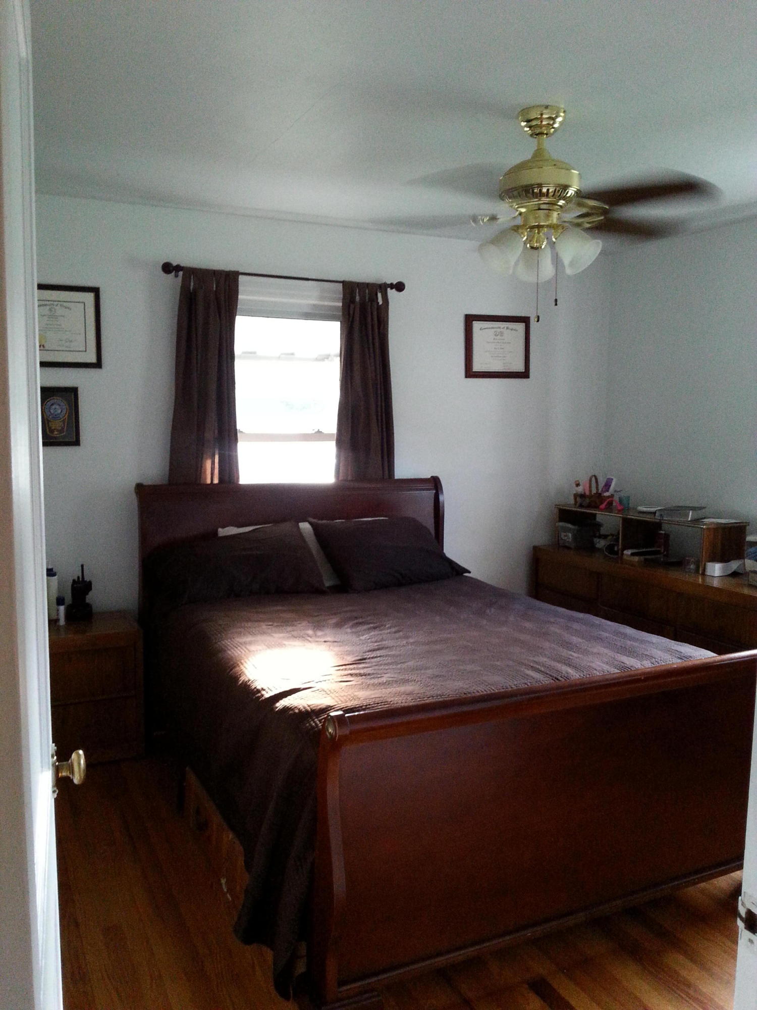 2021 Burma Road Salem, VA 24153 - Photo 3 of 13 a bedroom with a bed and a chandelier