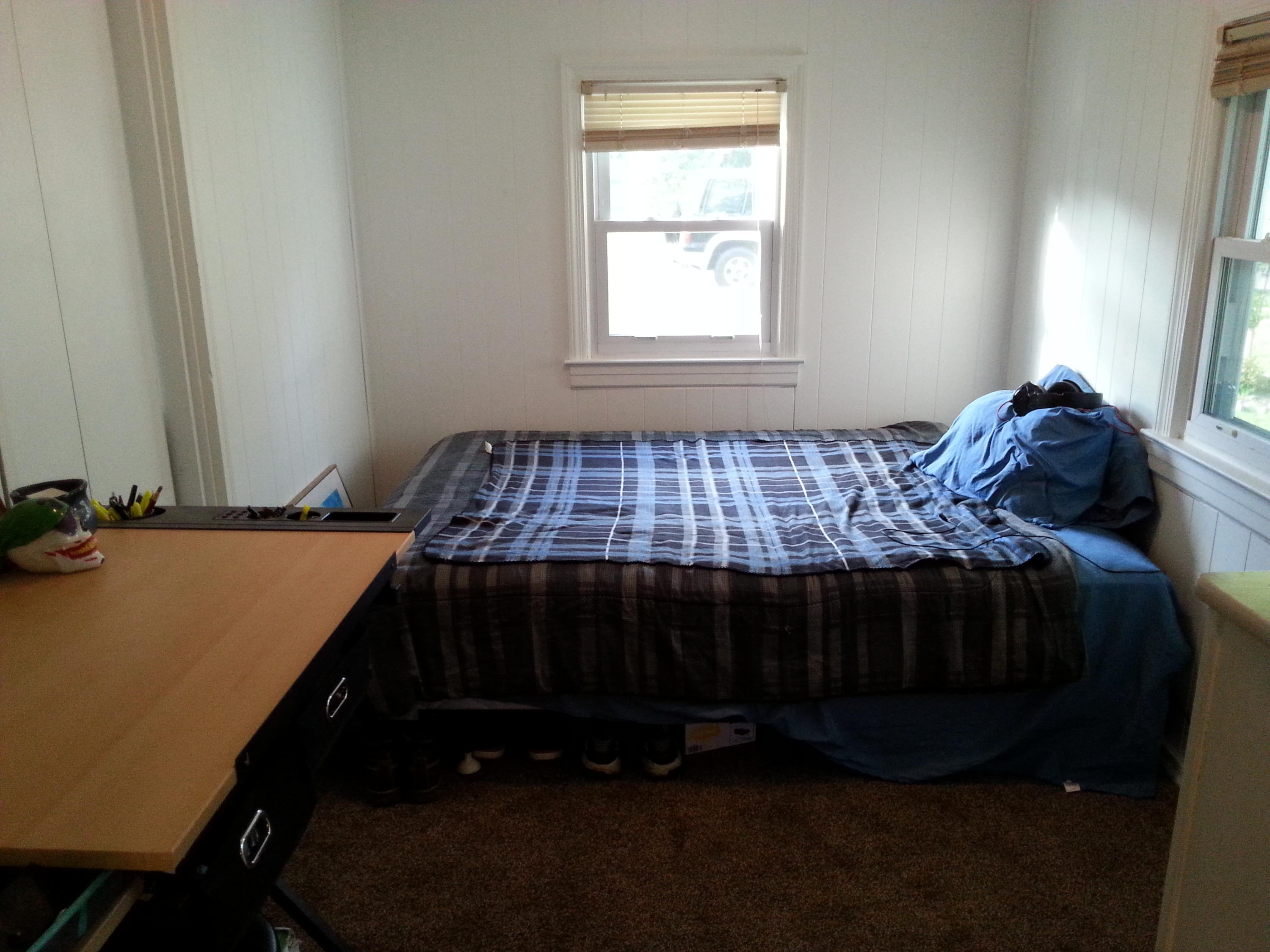 2021 Burma Road Salem, VA 24153 - Photo 7 of 13 a bedroom with a bed chair and a window