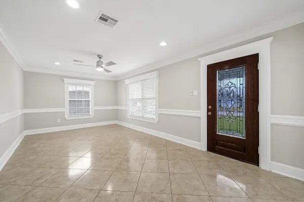 a view of an empty room with a window