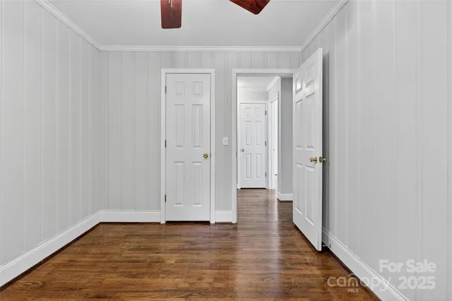 a view of a livingroom with wooden floor