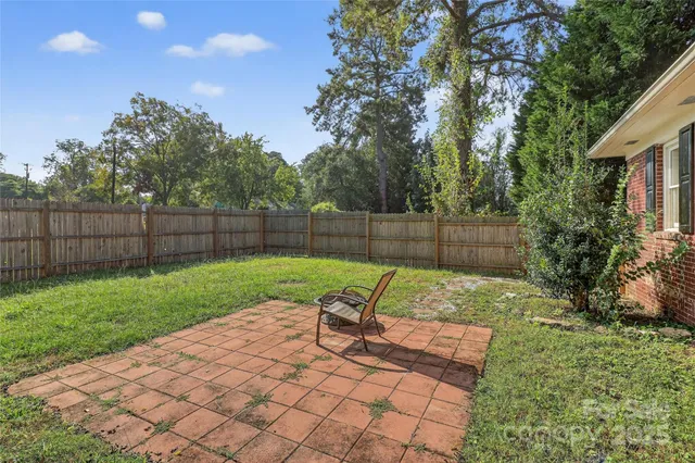 a view of a backyard with a slide