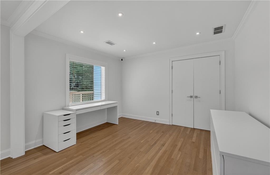 4610 West Morton Road Alpharetta, GA 30022 - Photo 27 of 53 a view of room with wooden floor and window