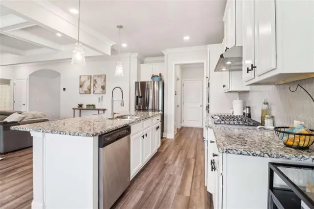 a living room with furniture a air conditioner vent and a window