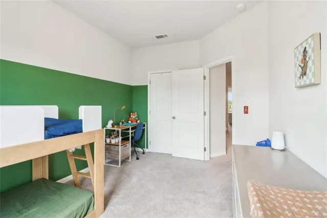 a living room with furniture a rug and a window