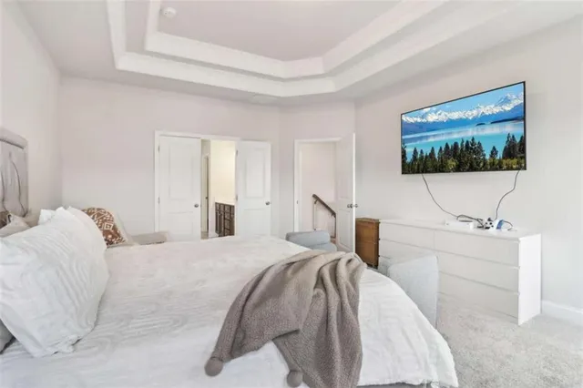 a view of a chairs and table in backyard