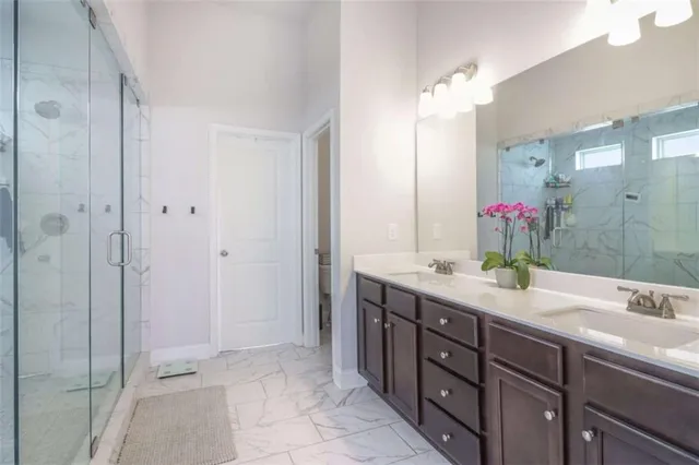 an aerial view of a house with swimming pool