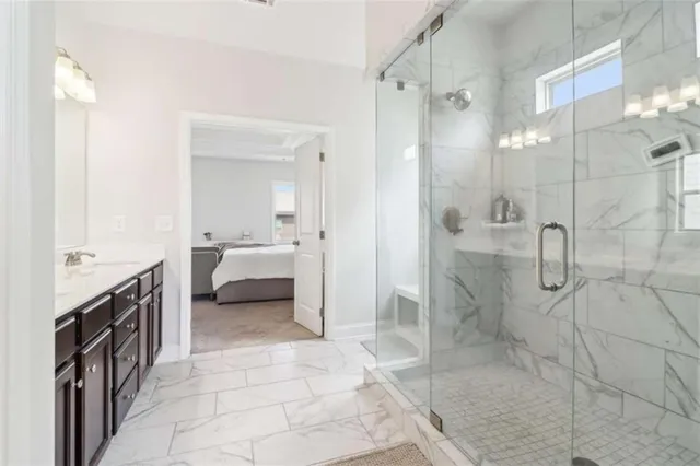 an aerial view of residential houses with outdoor space