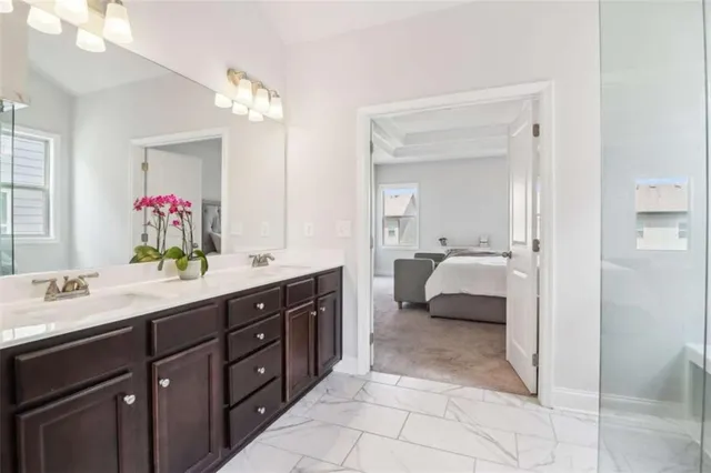 an aerial view of a residential houses with outdoor space