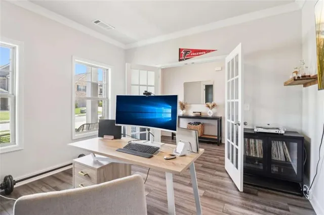 a view of a house with swimming pool and sitting area