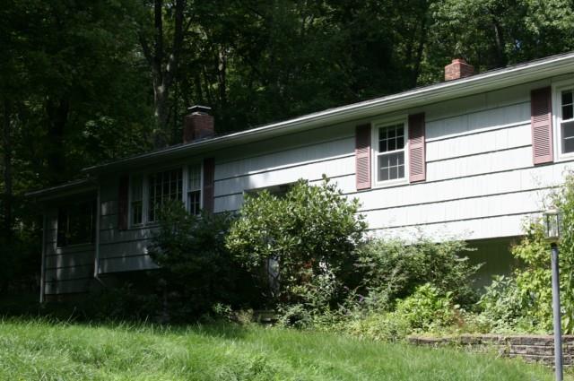 30 Scudder Road Newtown, CT 06470 - Photo 1 of 1 a view of a house with a yard