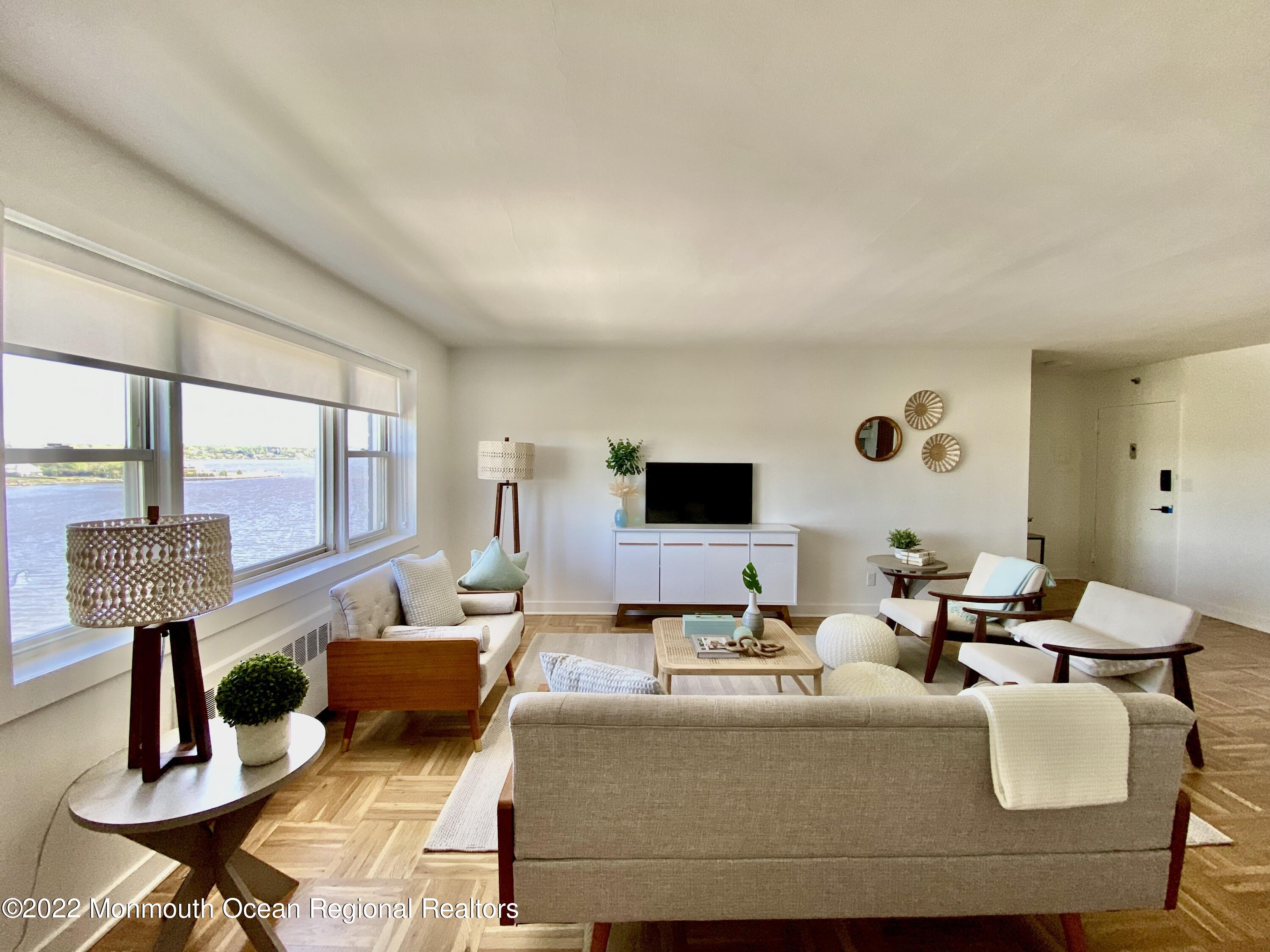 122 Bodman Place Red Bank, NJ 07701 - Photo 13 of 22 a living room with furniture and a large window