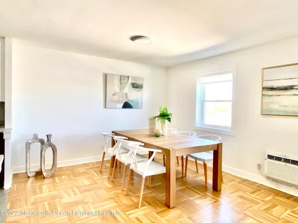 a view of a dining room with furniture