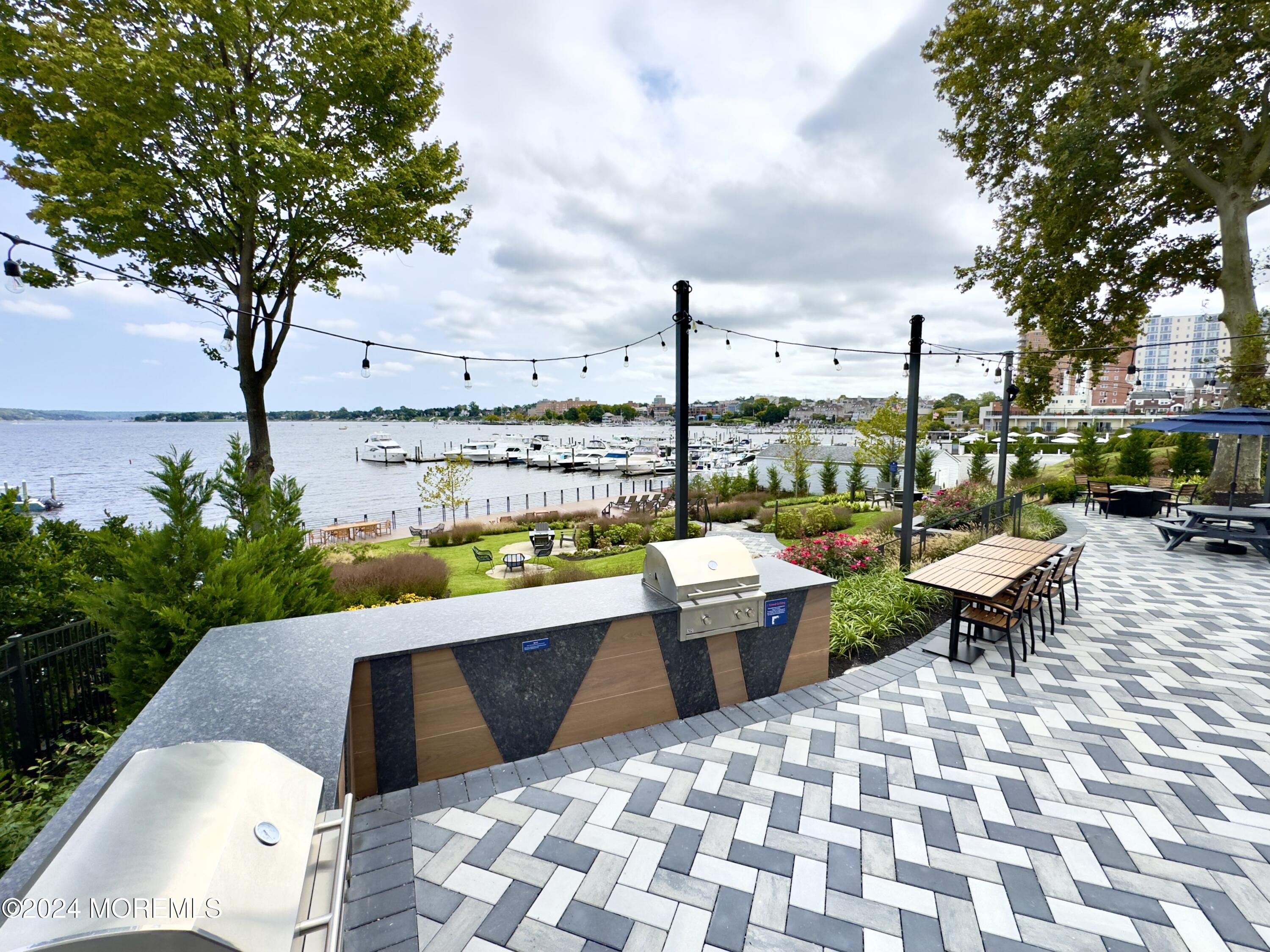 122 Bodman Place Red Bank, NJ 07701 - Photo 7 of 22 a view of swimming pool with outdoor seating and plants