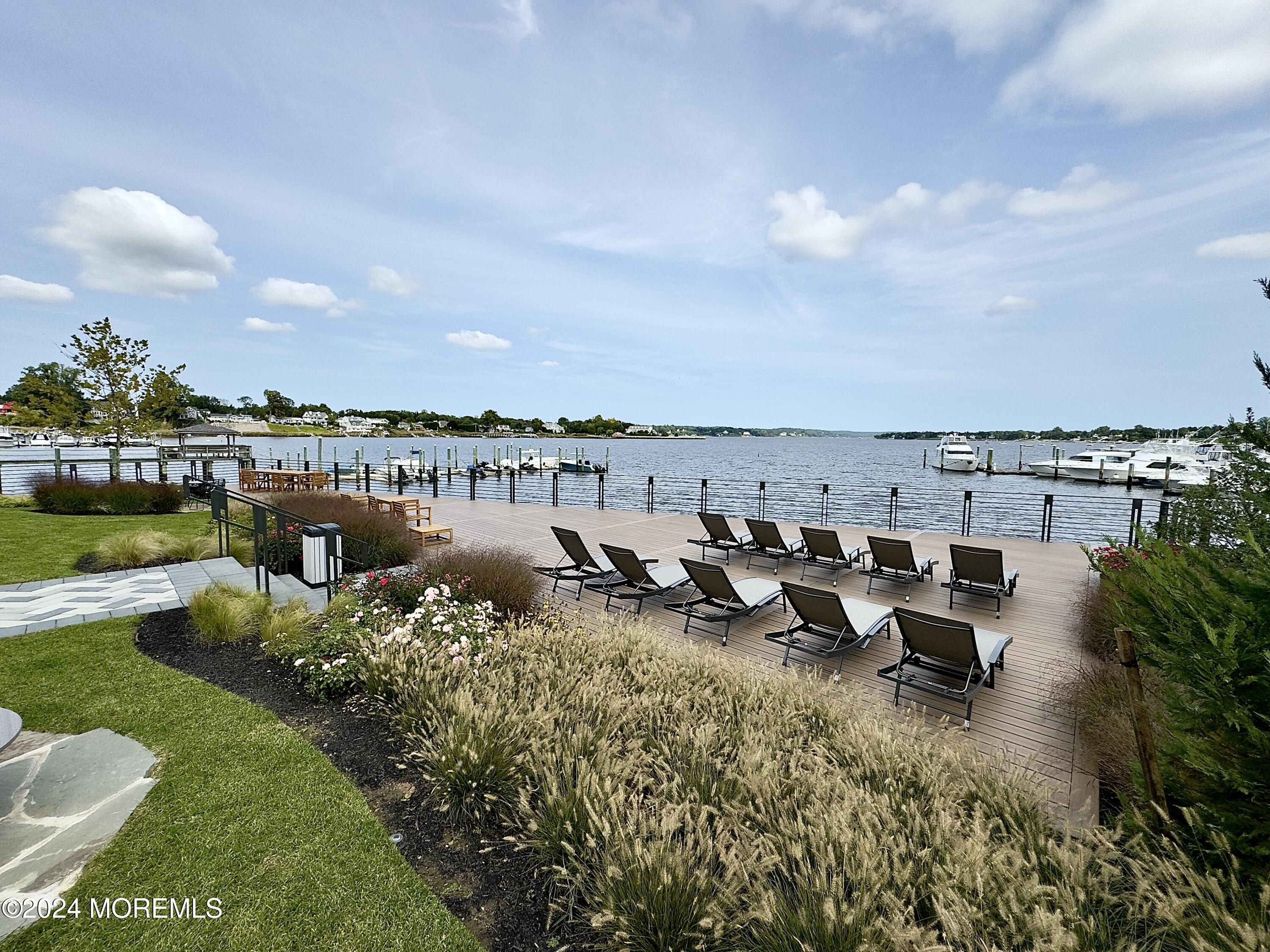 122 Bodman Place Red Bank, NJ 07701 - Photo 8 of 22 a picture of a lake with outdoor seating