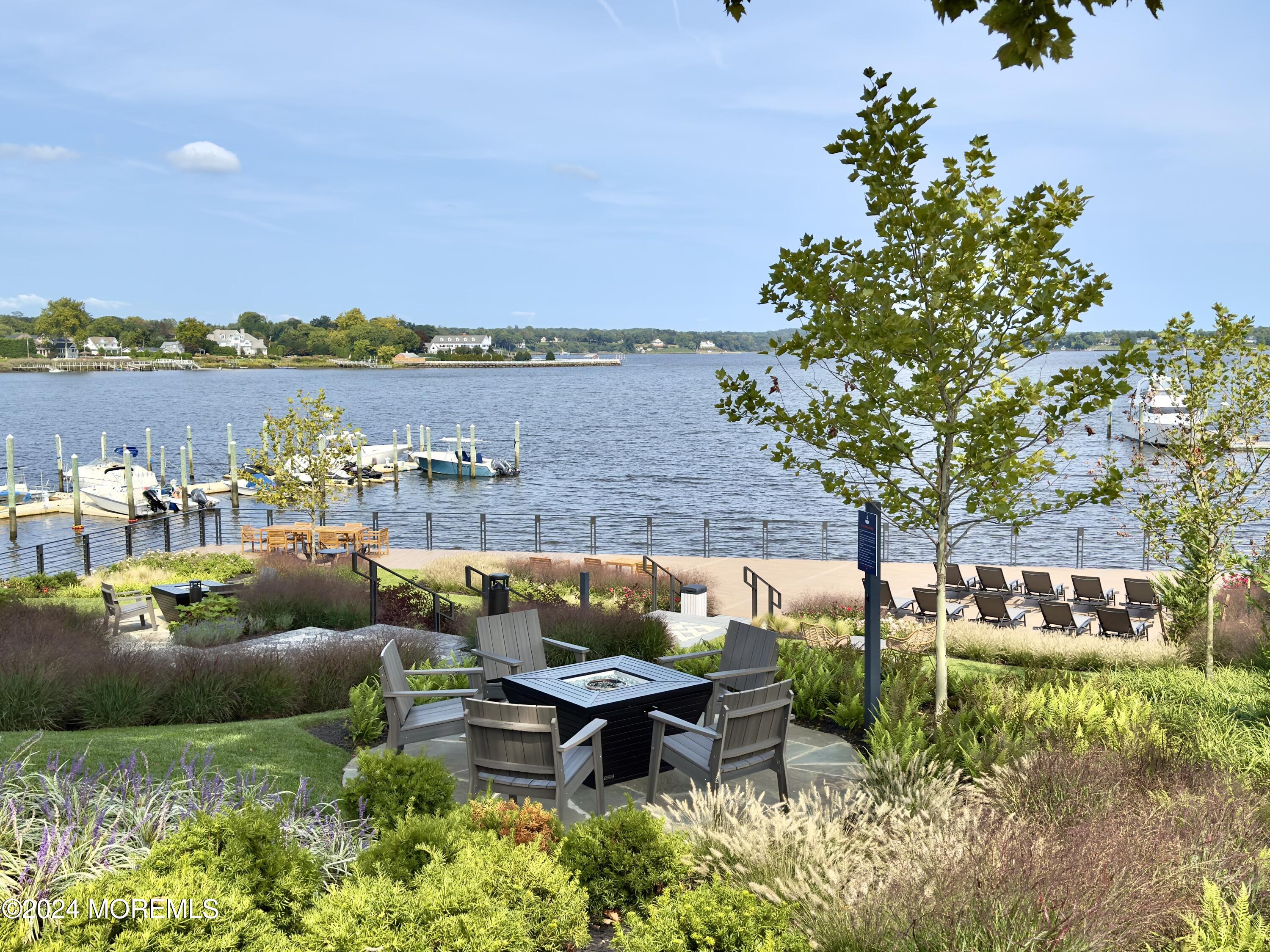 122 Bodman Place Red Bank, NJ 07701 - Photo 9 of 22 a terrace with outdoor seating and city view