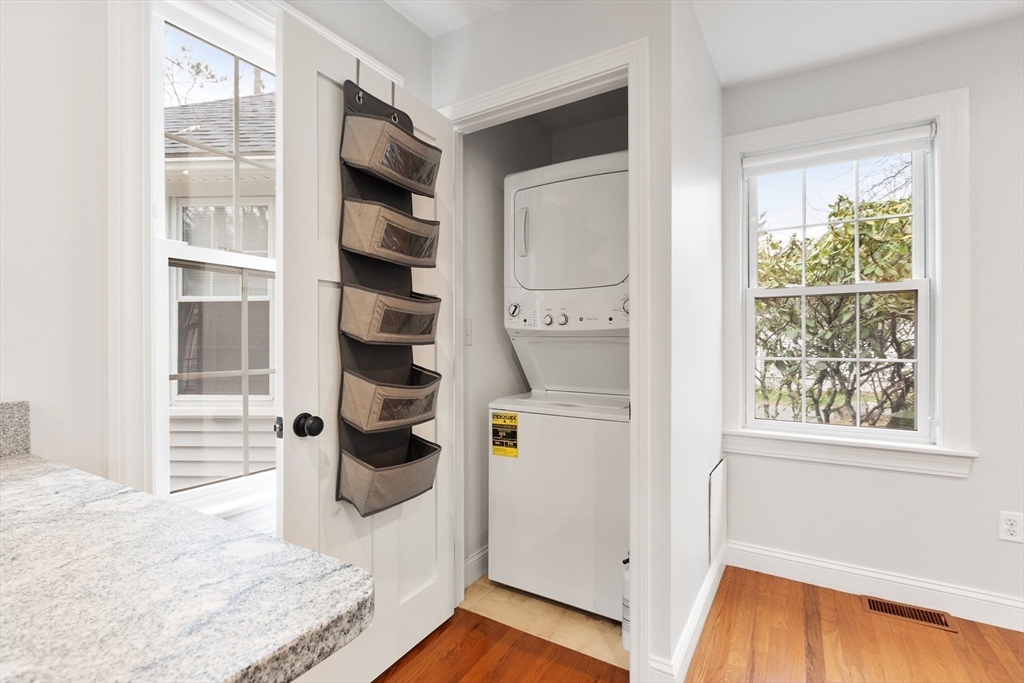 166 Parker Street, Unit 4 Maynard, MA 01754 - Photo 13 of 37 a view of an entryway with wooden floor and windows