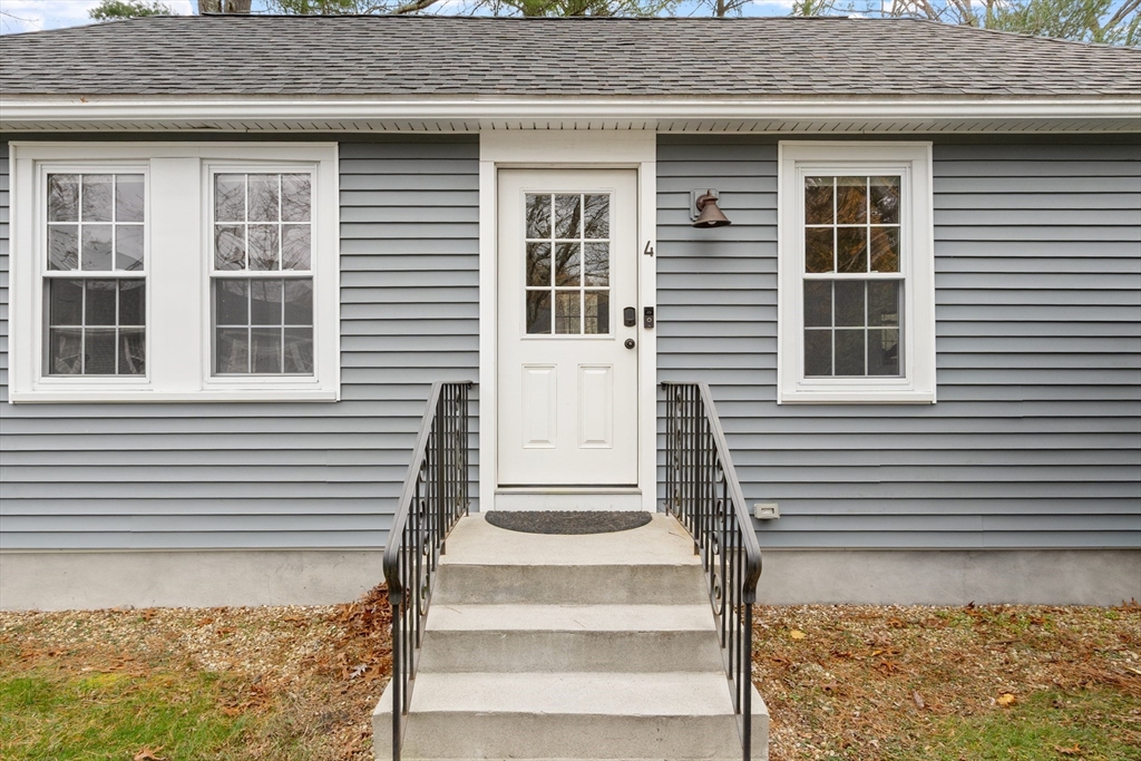 166 Parker Street, Unit 4 Maynard, MA 01754 - Photo 2 of 37 a front view of a house with a window