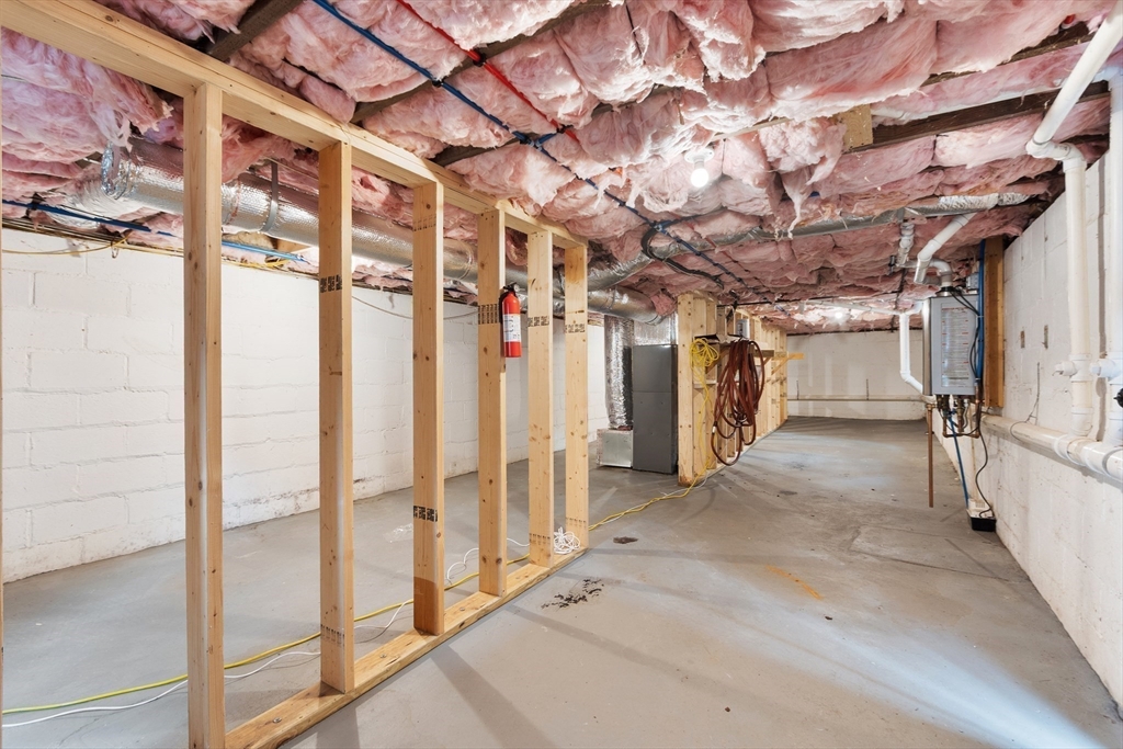 166 Parker Street, Unit 4 Maynard, MA 01754 - Photo 27 of 37 a view of a room with wooden walls