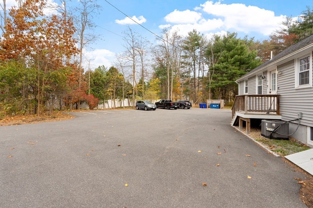166 Parker Street, Unit 4 Maynard, MA 01754 - Photo 33 of 37 a view of street with parked cars