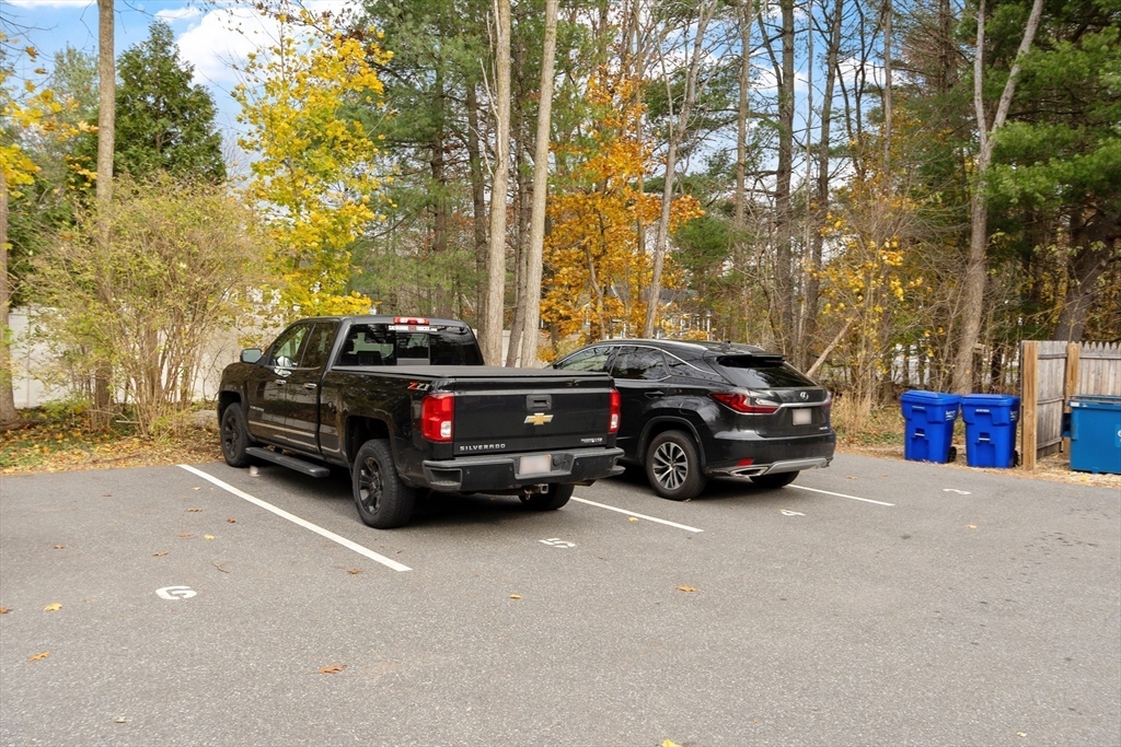 166 Parker Street, Unit 4 Maynard, MA 01754 - Photo 34 of 37 a view of a car in a parking lot